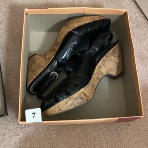 Black peep-toe wedge sandals